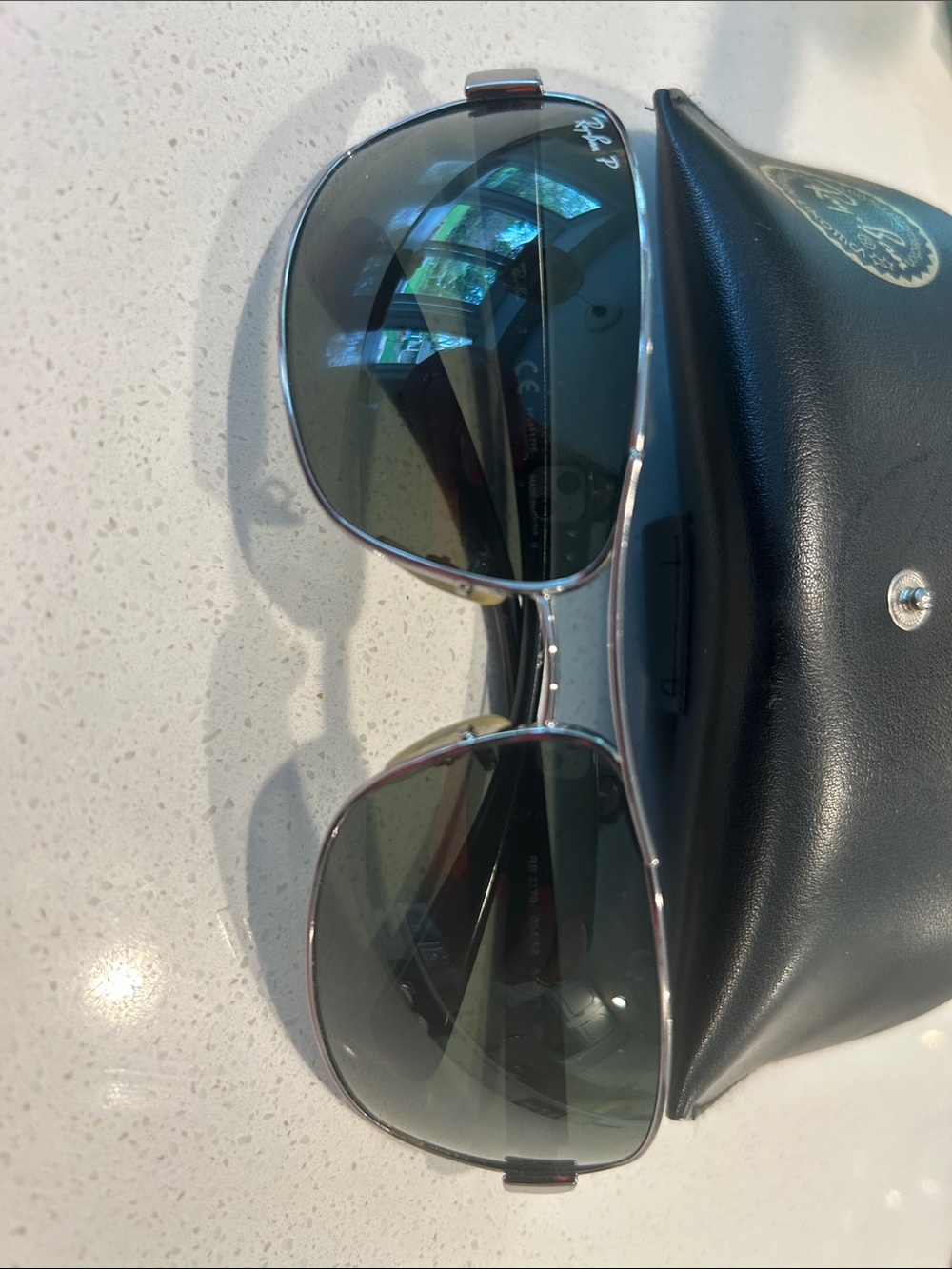 Ray-Ban Silver Frame Sunglasses with polarized Lenses and Black Temples